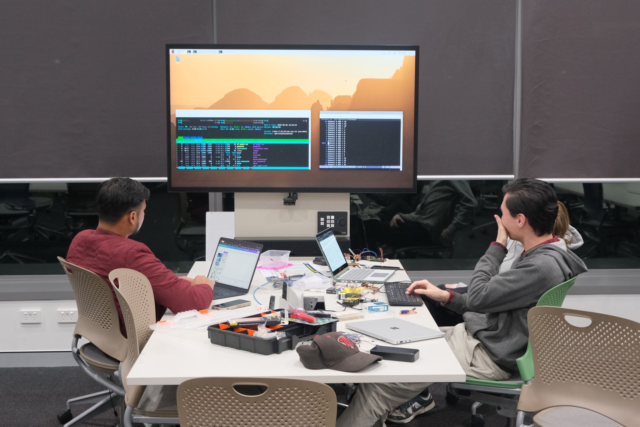 Brains and Bots team working on hardware and software